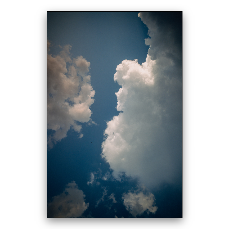 Example Square Frame export — a cloud photo padded onto a white square with a thin black frame
